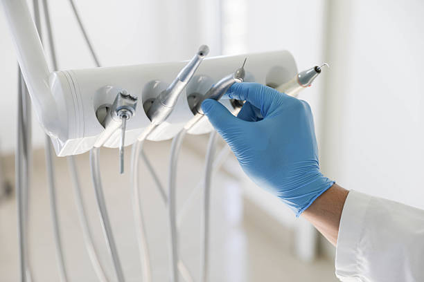Professional Tooth Extraction technician working in Faith, NC